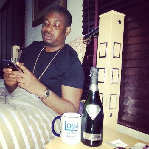 GIST-Don Jazzy gets the £1.2million champagne from Alexander Amosu