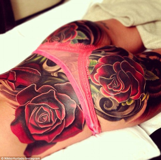 Photo : Cheryl Cole’s Ridiculous Rose bottom tattoo would cost N3Million to remove